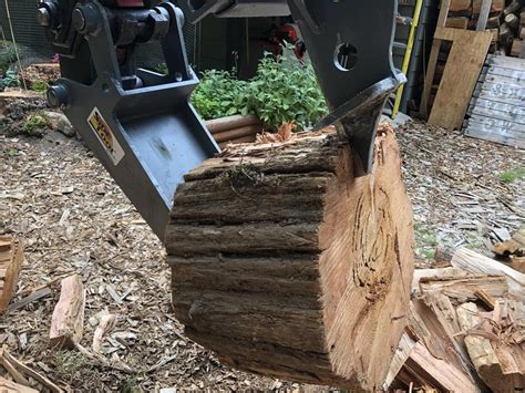 mini excavator wood splitter|mini excavator log splitter attachment.